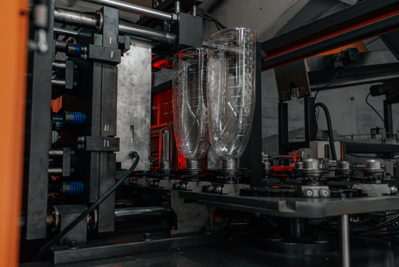 Modern plastic manufacturing facility floor with injection molding machines